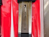 two knives that are sitting in a red case