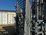 a lot of pipes that are on the side of a building