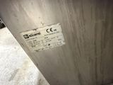 a label on the side of a stainless steel refrigerator