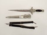 three different types of knives on a white surface