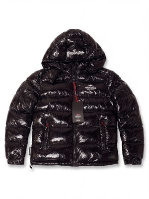 a close up of a black puffy jacket with a hood
