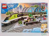 a box of lego city trains on display on the table