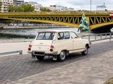 a small car that is parked on the side of the road