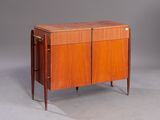 an image of a wooden cabinet with two doors and two drawers
