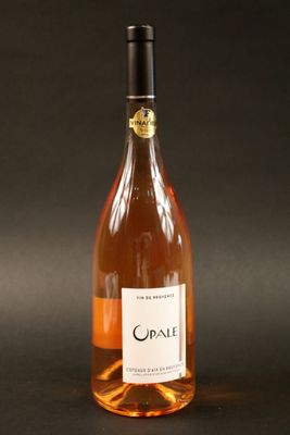 a bottle of wine that is sitting on a table