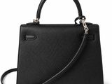 a black handbag on a white background