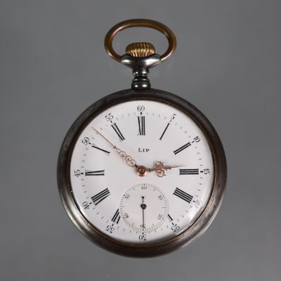 a silver pocket watch with roman numerals on it