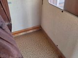 a bathroom with a shower and a window in it