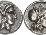 une pièce d'argent portant l'image d'une femme et d'un homme