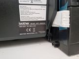 a picture of a brother machine that is sitting on a table