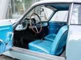 a close up of a car ' s interior with the door open