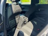 the back seat of a car with a bag in it