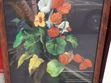 a picture of a painting of flowers on a table