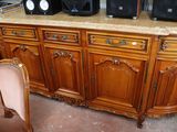 an image of a large wooden cabinet with speakers on top of it