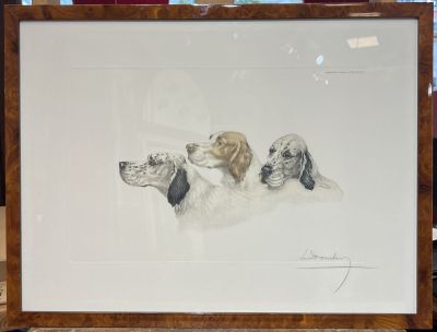 a picture of a picture of three dogs on a table
