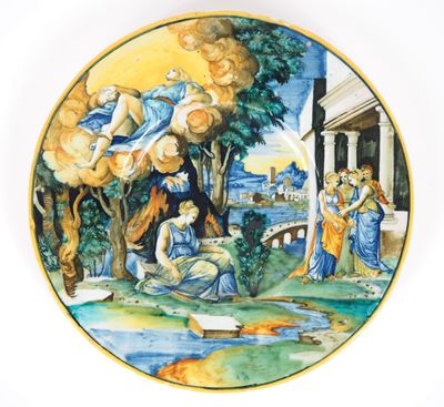 an image of a plate with a painting of a biblical scene on it