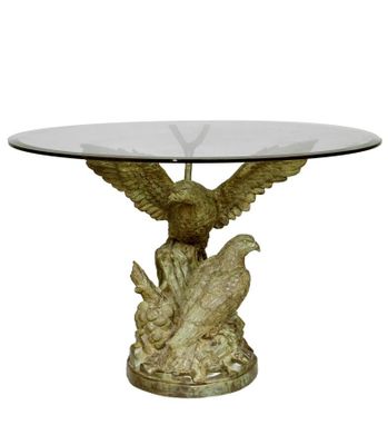 an image of a glass table with a bird on it