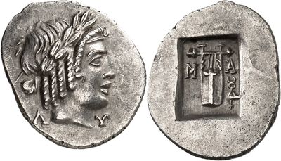 a silver coin with an image of a man on it