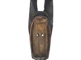 an image of a wooden mask with two ears and a face on it