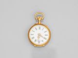 an antique gold pocket watch with roman numerals and roman numerals on the face