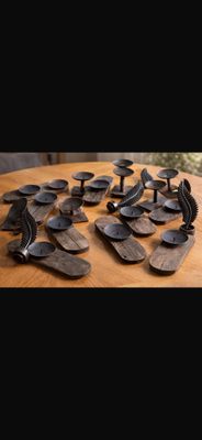 many pairs of shoes that are sitting on a table