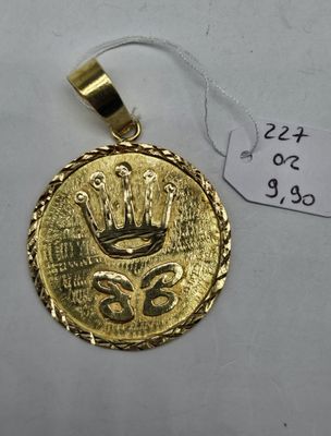 a gold coin with a crown on it and a price tag