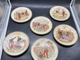 six assiettes qui se trouvent dans une boîte posée par terre