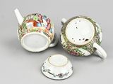 three different types of teapots and cups on a gray surface