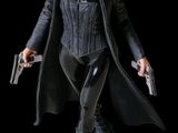 the action figure is dressed in a black outfit and holding two guns
