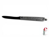 a knife with a black handle on a white background
