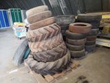 a pile of tires sitting on a pallet in a warehouse