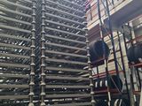 a lot of racks that are stacked up in a building