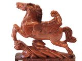a statue of a horse that is standing on its hind legs