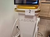 a picture of a laser machine in a room