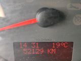 a close up of a speedometer on the dashboard of a car