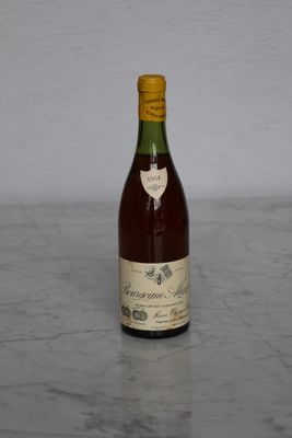 a bottle of wine that is sitting on a table