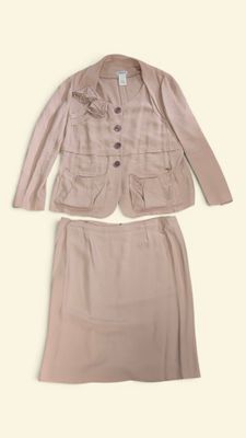 a picture of a women ' s skirt suit and jacket