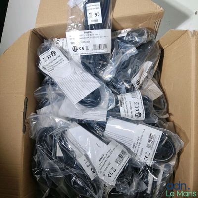 a cardboard box full of electronic equipment that is in the box