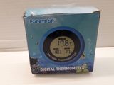 a box of digital thermometer sitting on a counter