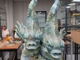 two fish that are sitting on top of a table