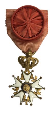 l'image d'une médaille surmontée d'une étoile