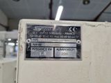 une photo d'un panneau apposé sur le côté d'une machine