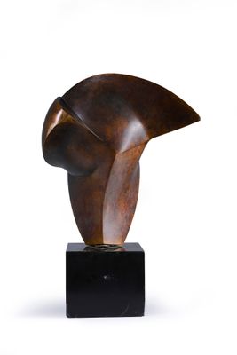 an image of a bronze sculpture of a woman ' s head on a black base