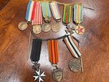 a table with a lot of medals and medals on it