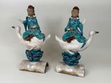 paire de figurines chinoises représentant une femme et un homme assis sur un cygne