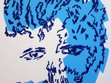 an image of a blue drawing of a woman ' s face on a piece of paper