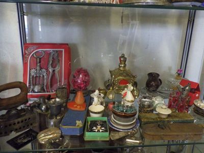 a glass shelf that has various items on it
