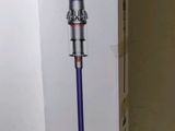 the box of the dysonon vacuum is open on the table