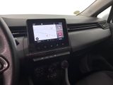 the dashboard of a car with a tablet on the dashboard