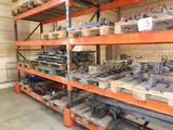 many different types of tools on the shelves in the warehouse